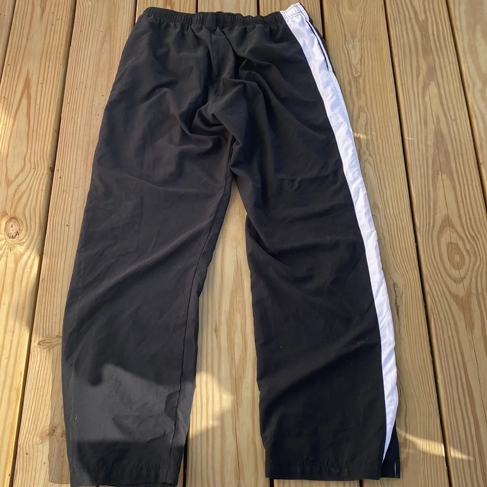 🍍NIKE WIND PANTS🍍SLIT ANKLE🍍DRAW STRING🍍POCKETS🍍SIZE 12-14🍍H-5